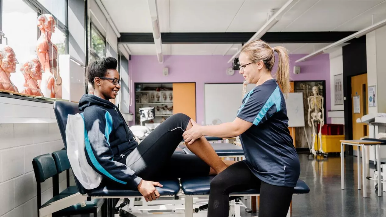 Physiotherapist working on a student in the labs at Stratford