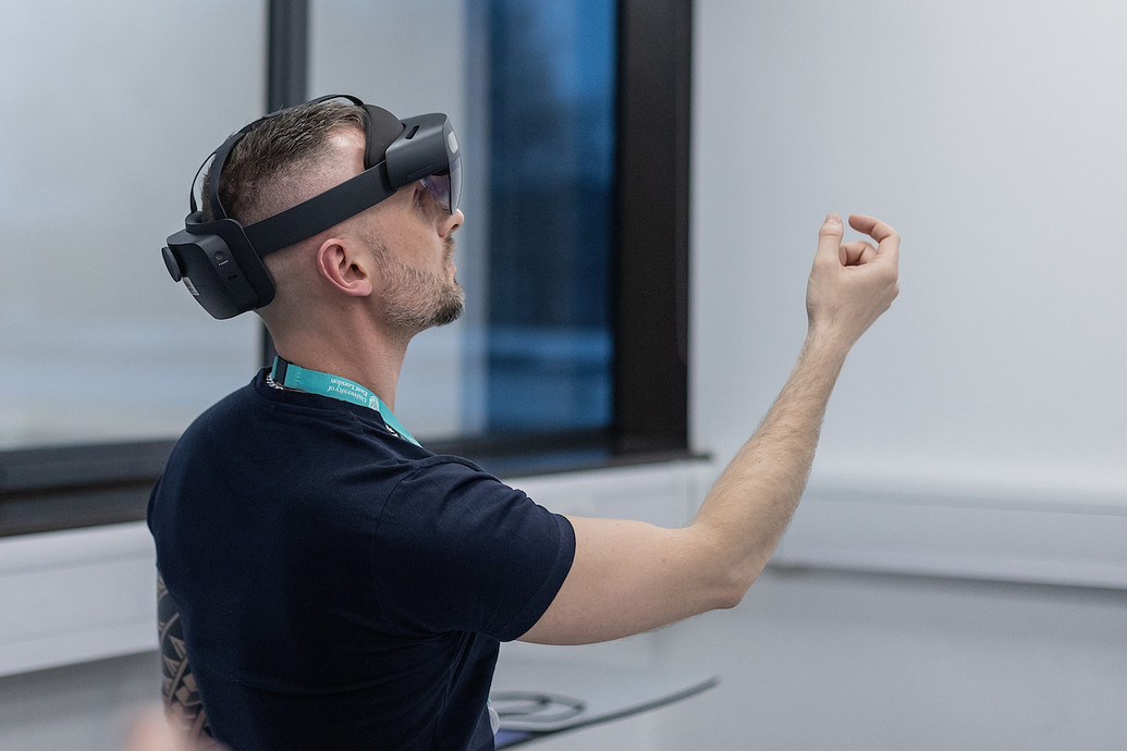 Man demonstrating AR and VR technology in the Hospital and Primary Care Training Hub.