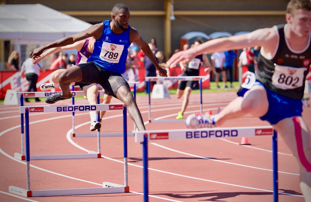 Athletes competing in a track event