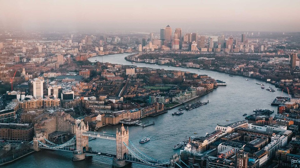 Aerial view of Thames with Tower Bridge in centre