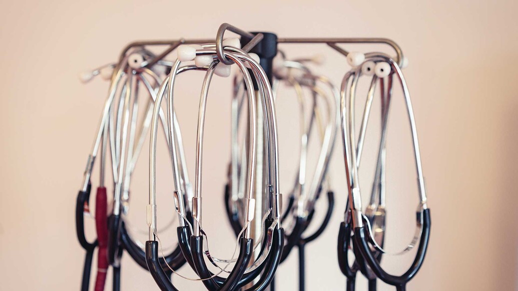 An image of stethoscopes hanging